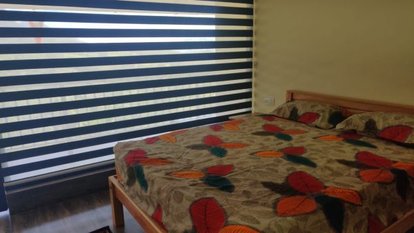 swimming pool resort in suryanelli bedroom5