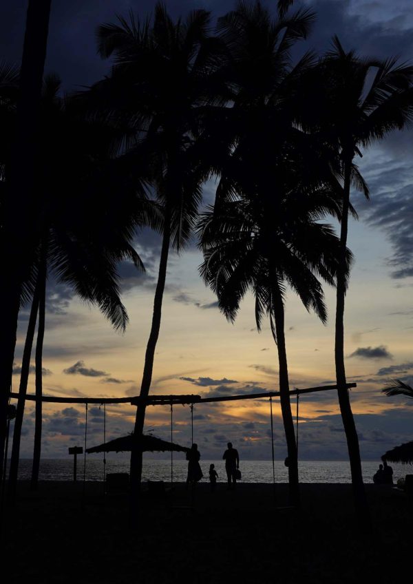 sunset at Luxury Beachfront Resort with Swimming Pool in Nileswar, Kerala